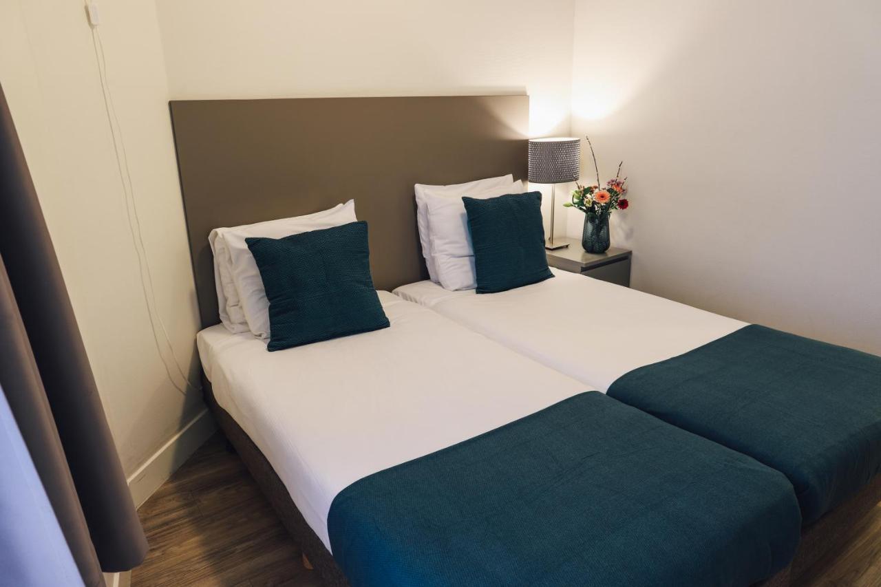 Tweepersoonskamer met 2 Aparte Bedden